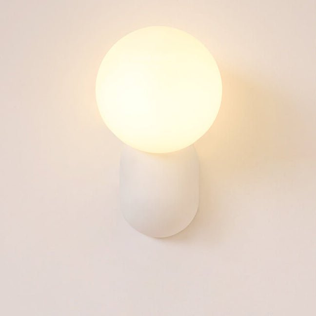 Aplique de pared moderno con globo de vidrio y una luz para iluminación del hogar