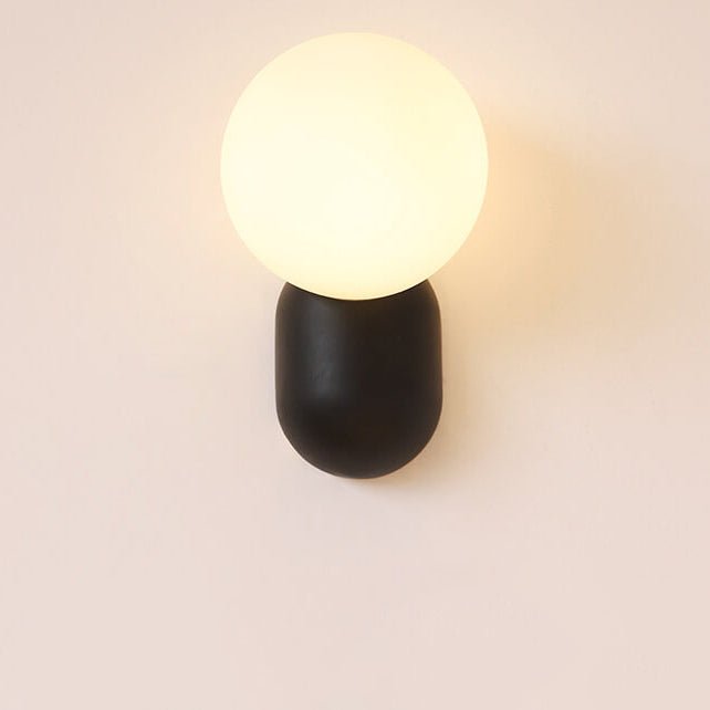 Aplique de pared moderno con globo de vidrio y una luz para iluminación del hogar