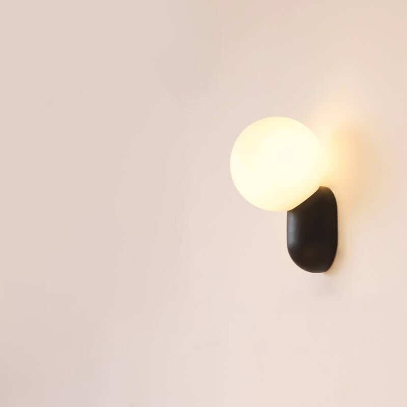 Aplique de pared moderno con globo de vidrio y una luz para iluminación del hogar
