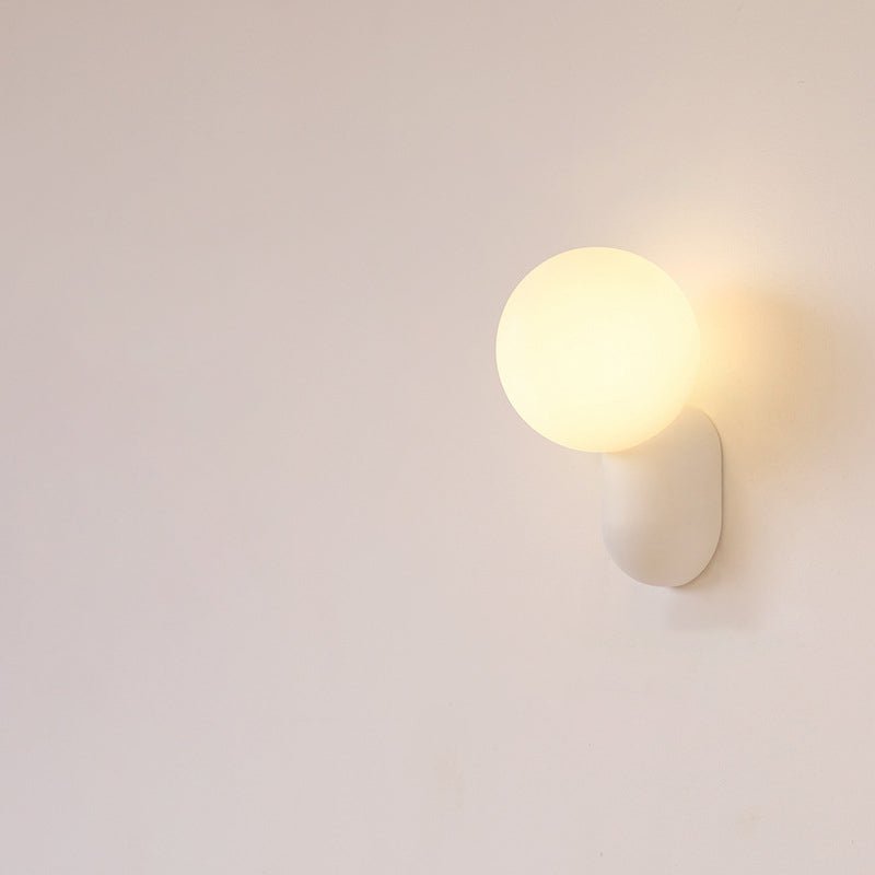 Aplique de pared moderno con globo de vidrio y una luz para iluminación del hogar