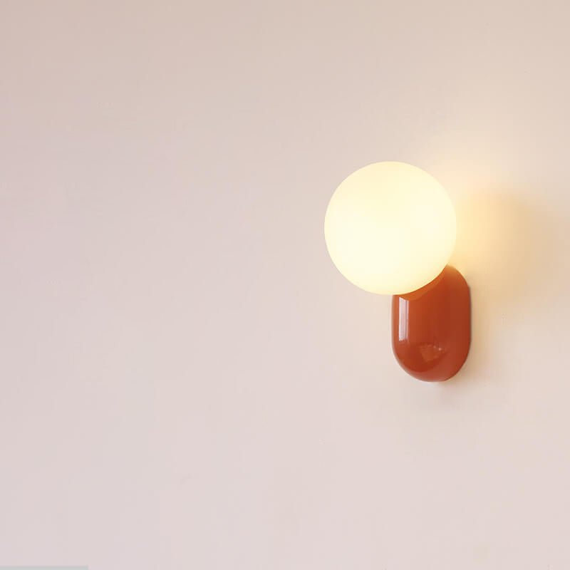 Aplique de pared moderno con globo de vidrio y una luz para iluminación del hogar