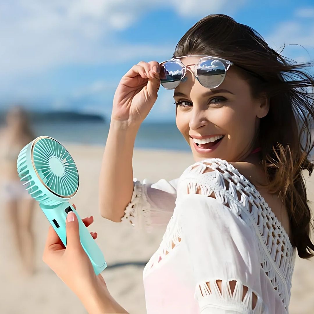 Ventilador portátil de mano BREEZIX para enfriamiento instantáneo en cualquier lugar