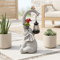 Lanterne de jardin féerique éléphant solaire avec une fée chevauchant un éléphant