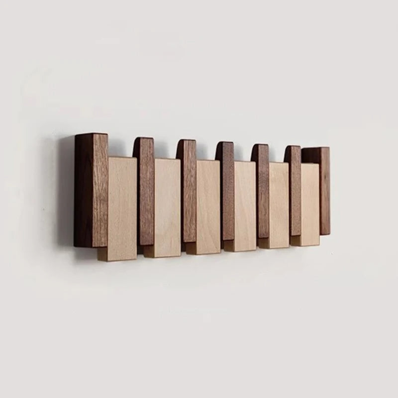 Eloria Garderobe im Klavierstil aus Holz mit klappbaren Haken