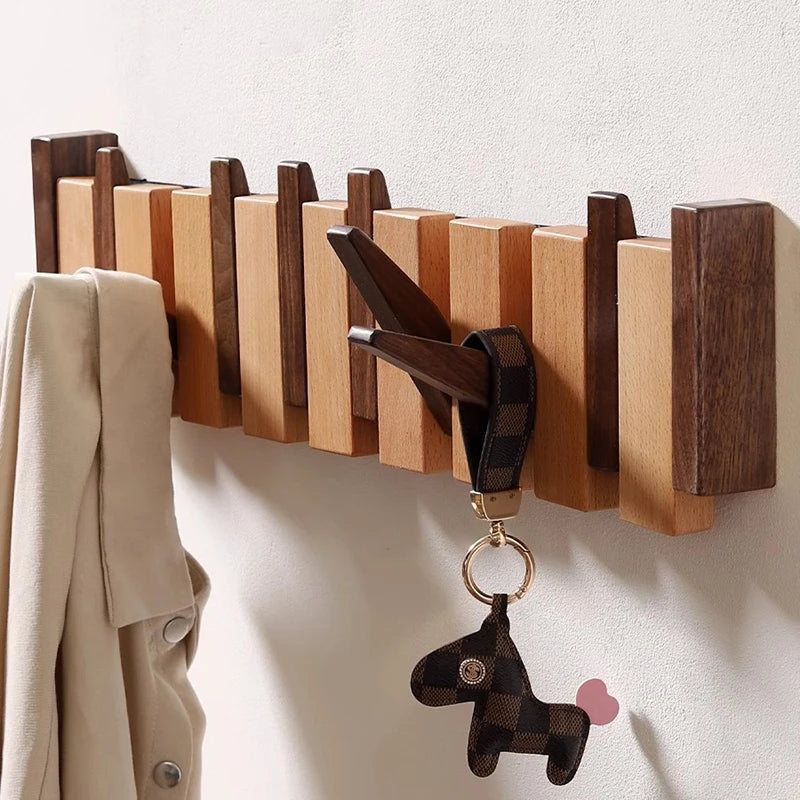 Eloria Garderobe im Klavierstil aus Holz mit klappbaren Haken