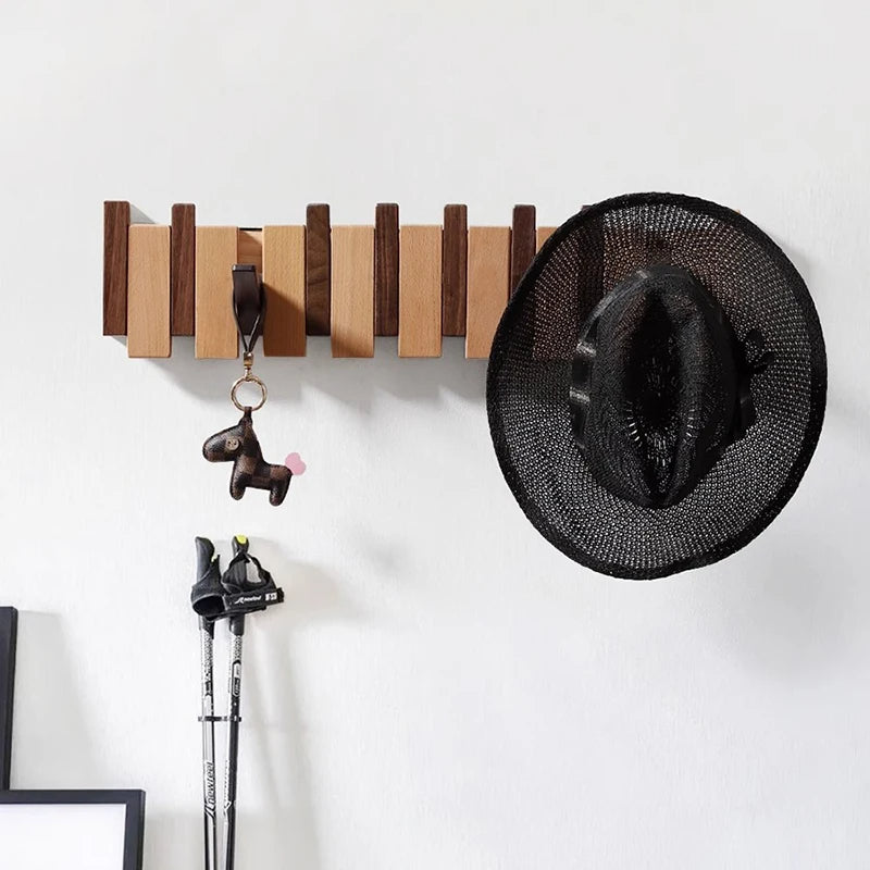 Eloria Garderobe im Klavierstil aus Holz mit klappbaren Haken