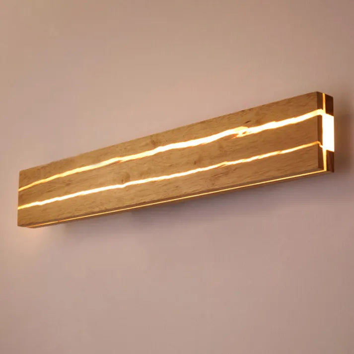 Sylvanor tre vegglampe med varm, sprukket kornstruktur