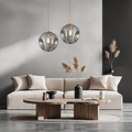 Novae Glass Pendant Light With Minimalist Silhouette