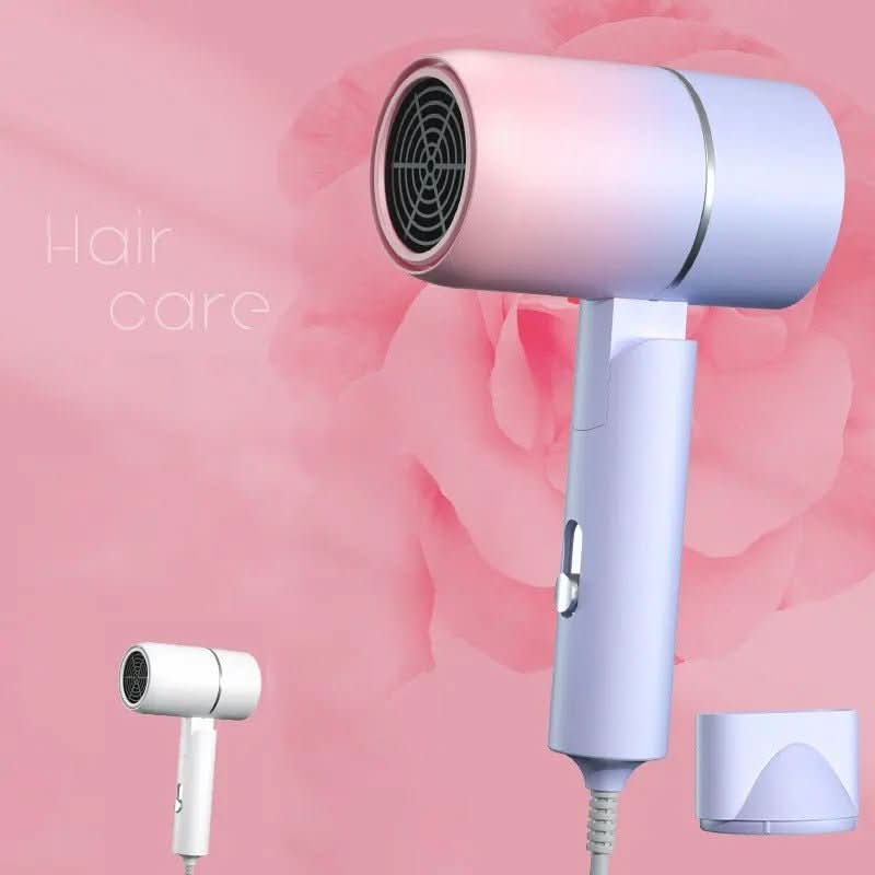 Sèche-cheveux pliable VoyageGleam avec technologie ionique pour des cheveux brillants