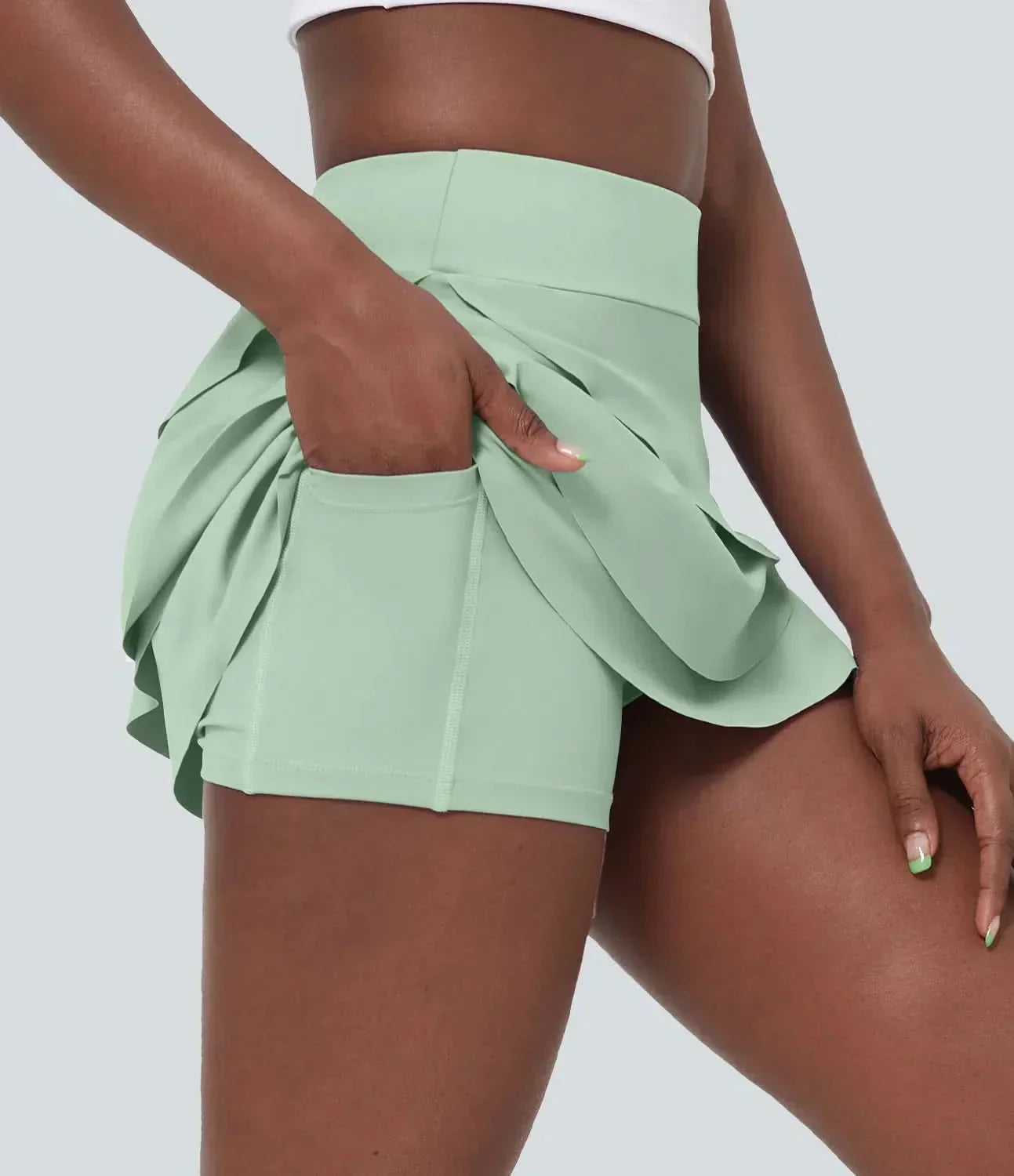 NexStride Airy 2-in-1 golfhame taskuilla urheilullisille naisille