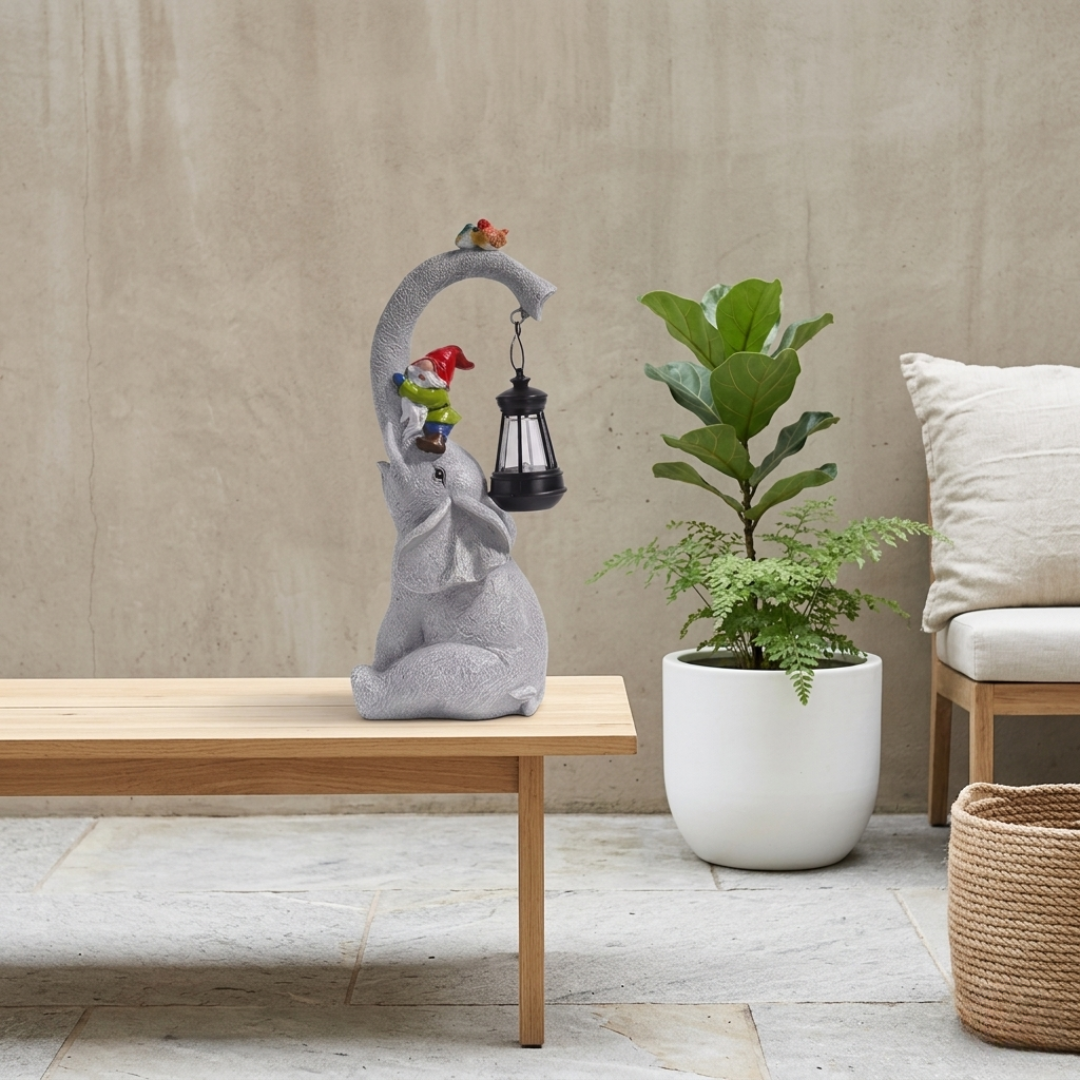 Lanterne de jardin féerique éléphant solaire avec une fée chevauchant un éléphant