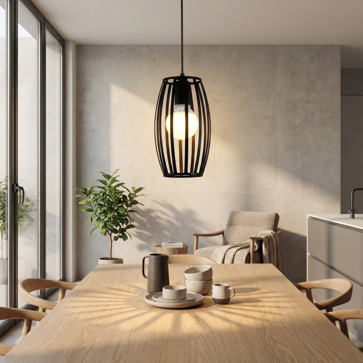 Black Metal Pendant Light With Oval Cage Design For Modern Spaces