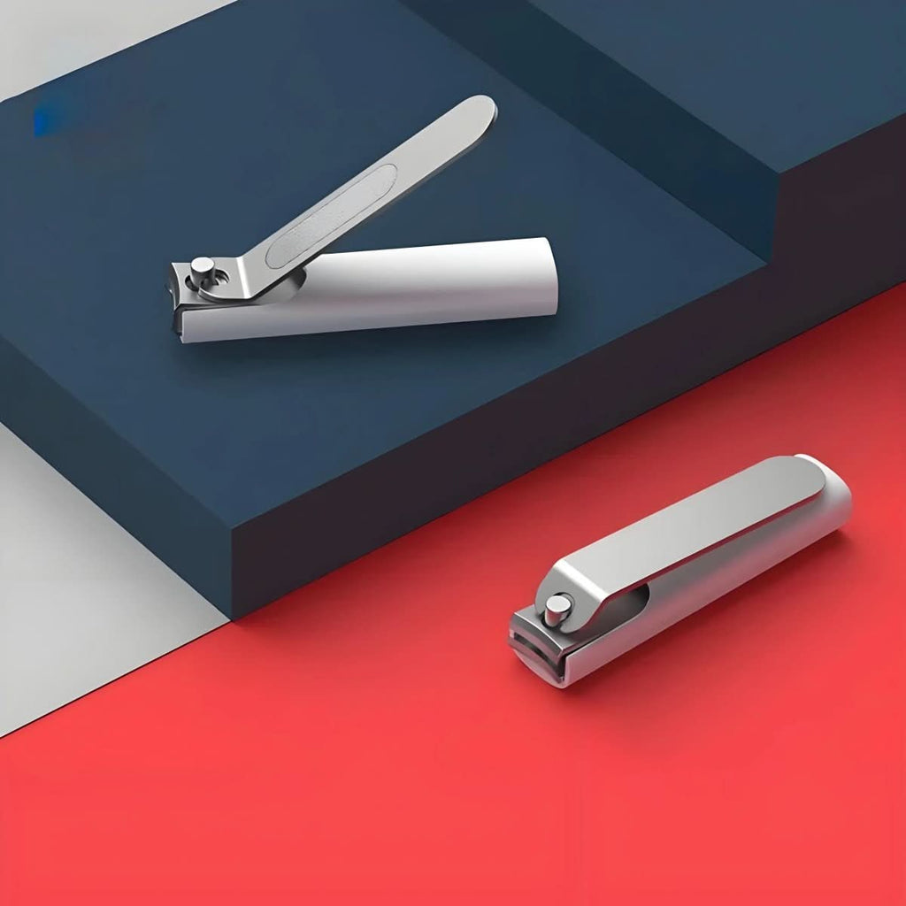 NailShield Kompakter Nagelknipser mit Spritzschutz und integriertem Feilen für den Heimgebrauch