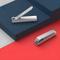NailShield Kompakter Nagelknipser mit Spritzschutz und integriertem Feilen für den Heimgebrauch