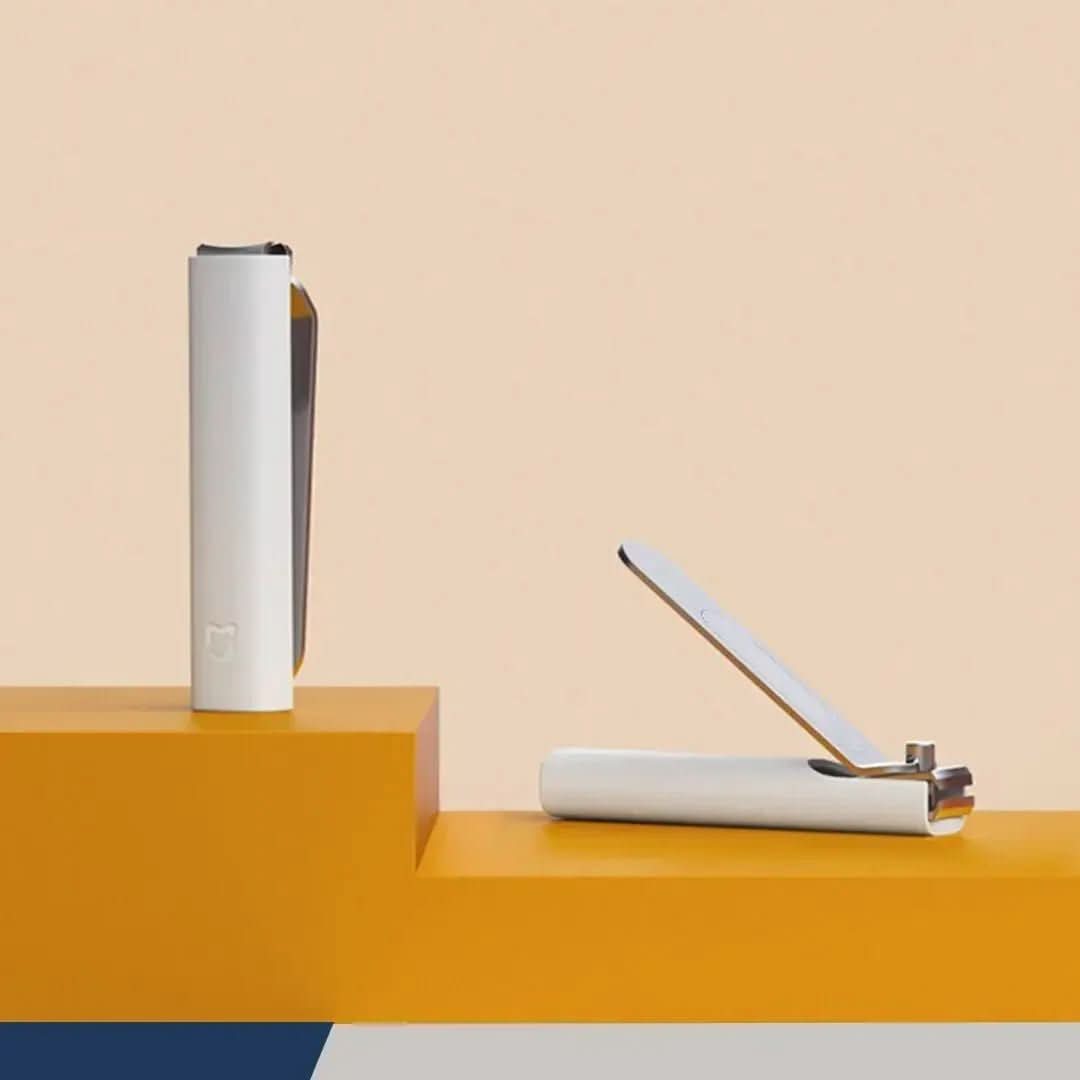 NailShield Kompakter Nagelknipser mit Spritzschutz und integriertem Feilen für den Heimgebrauch