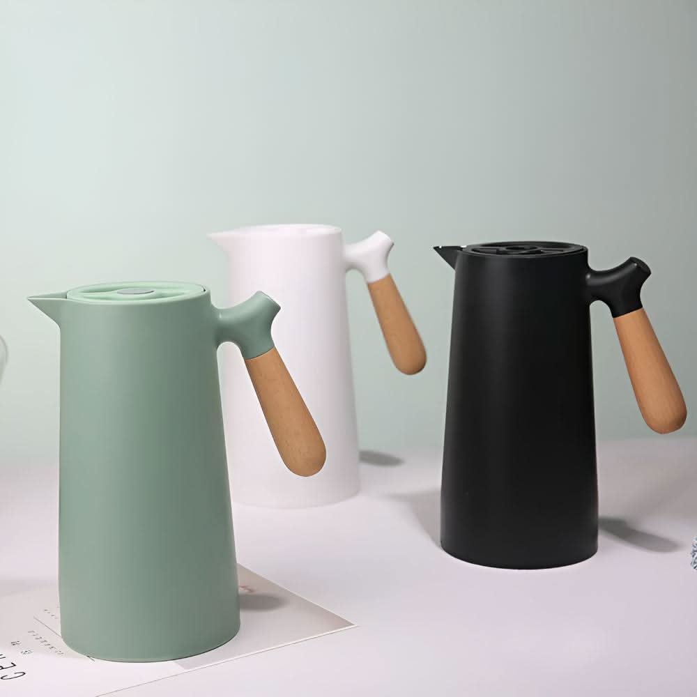 LuminaCarve dobbelvegget glasskaraffel med trehåndtak for varme og kalde drikker