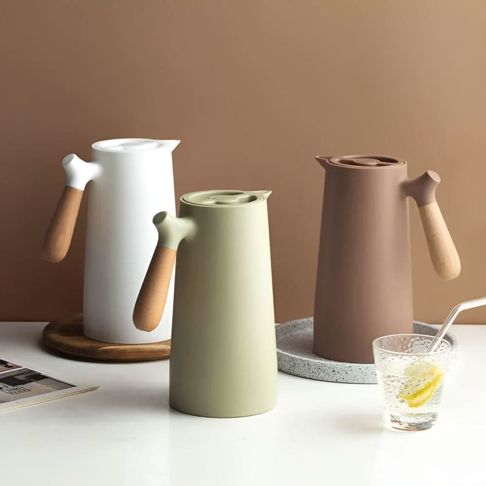 LuminaCarve dobbelvegget glasskaraffel med trehåndtak for varme og kalde drikker