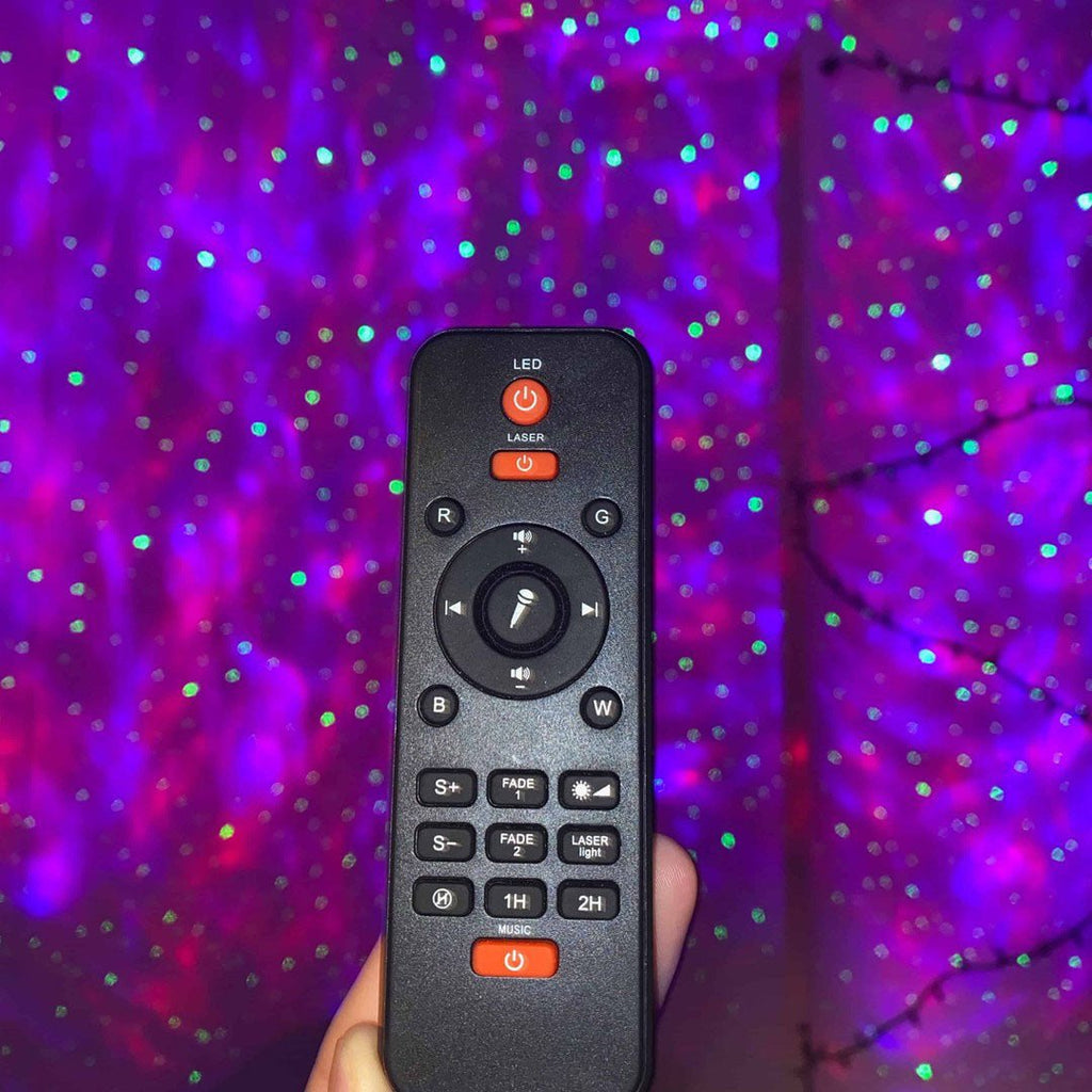 NebulaGlow bærbar galakseprojektor med fjernbetjening og Bluetooth-højttaler til soveværelser