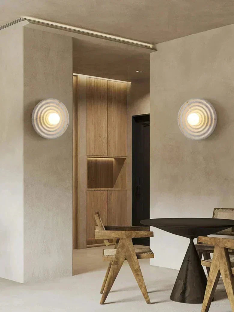 Aurelle vegglampe LED opp og ned perforert resin- og jernkonstruksjon
