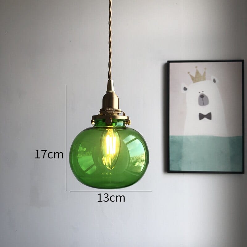 Liora glasskule hengelampe med børstet messing lampeholder og vintage nyanser