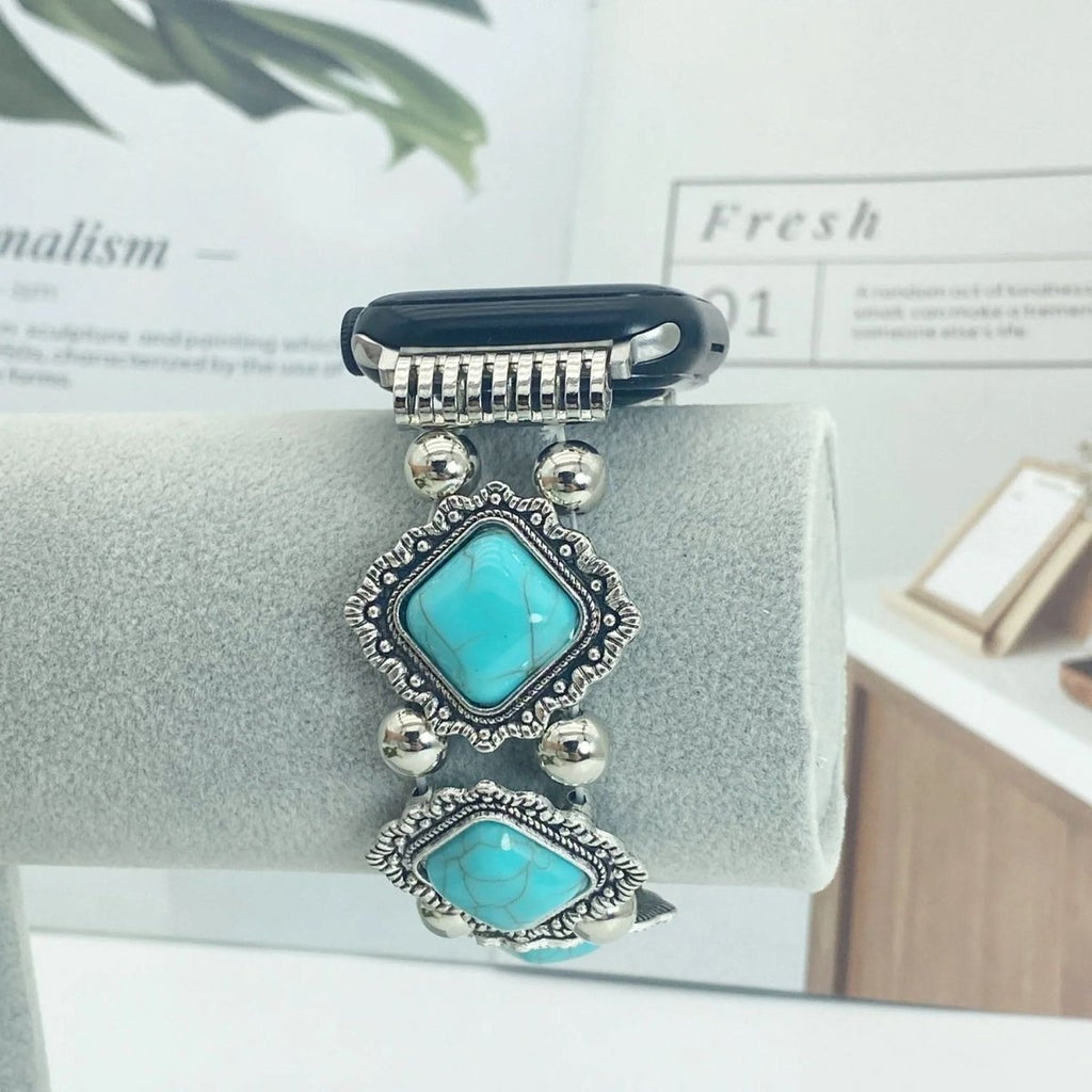 Luma Boho-Chic smartklokkerem med turkise detaljer for moteglade