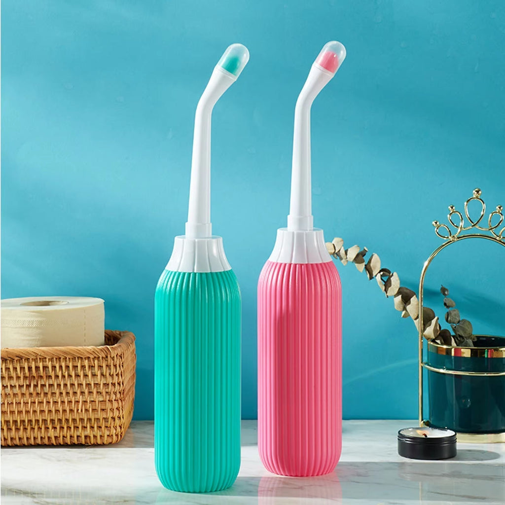 Reisebidet med 500 ml kapasitet og dobbel dyse