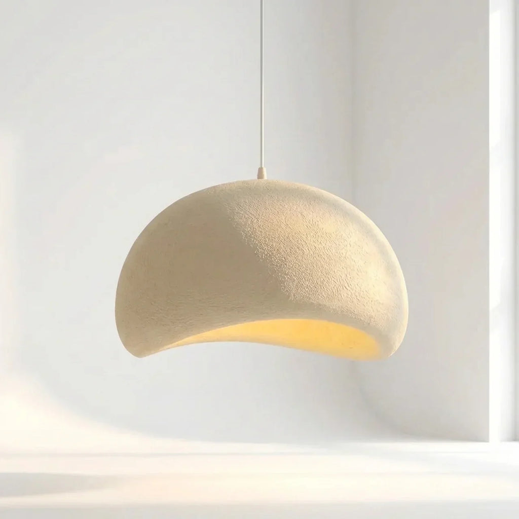 Lampada a sospensione Galet Air con forma organica ispirata alla pietra