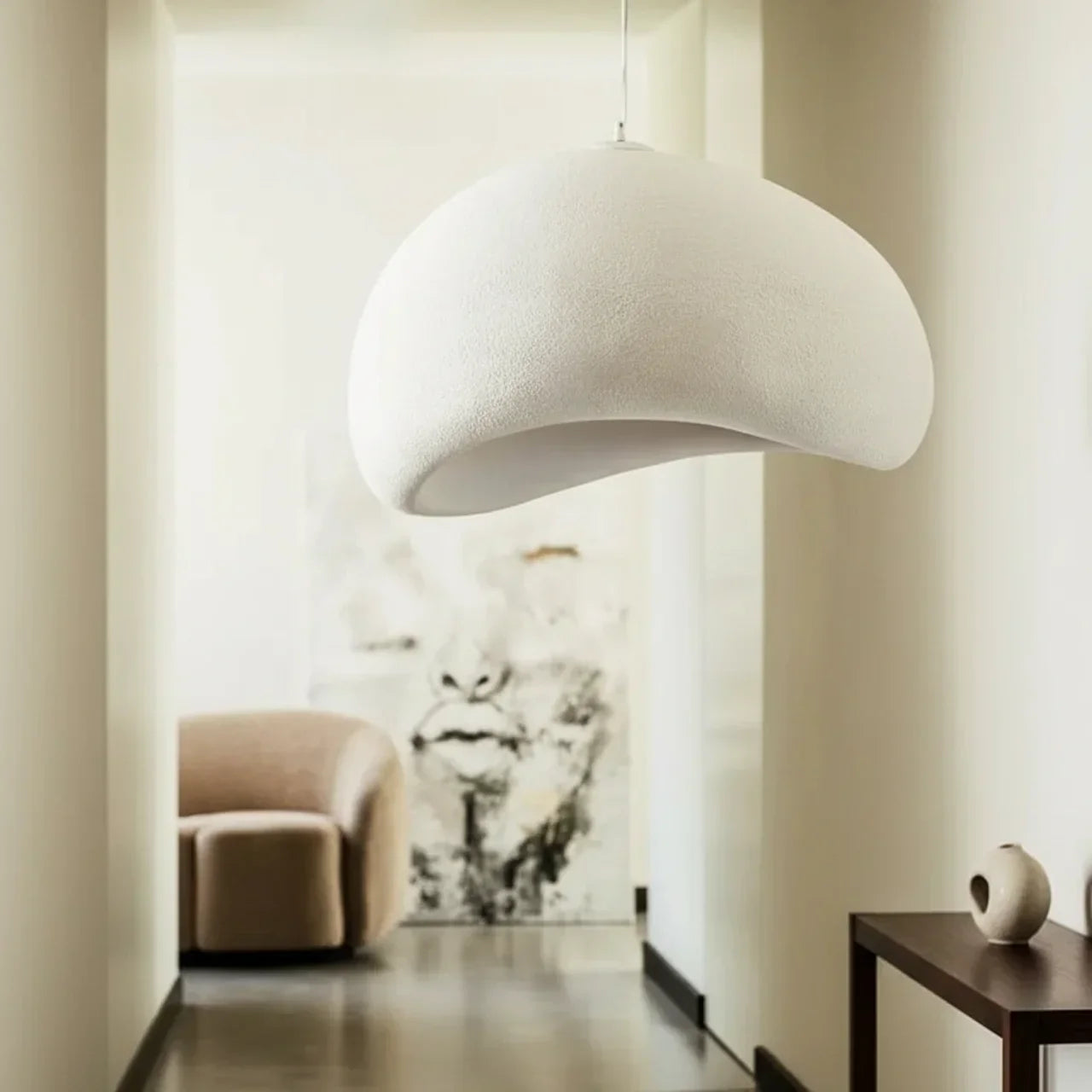 Lampada a sospensione Galet Air con forma organica ispirata alla pietra