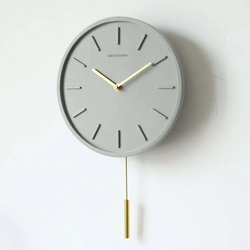 Lundra | Scandinavian Cement Wall Clock With Metal Pendant | Orntli